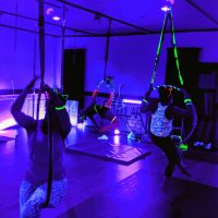 Gallery 1 - SOLD OUT - Blacklight Aerial Hoop Class